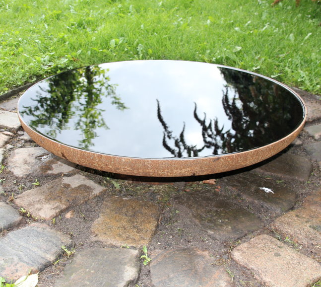 Rundt spejlbassin jern rust